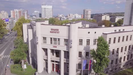 slow cinematic revealing shot of building of law faculty, university of belgrade