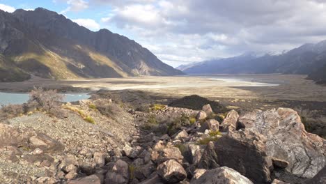 glacier lake and river, aoraki mount cook national park in south island, new zealand - wide shot