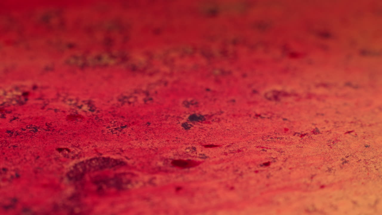 Colourful, organic, liquids macro shots buzzing and flowing