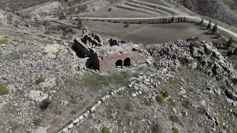 View-from-above-of-the-rock-ruins-at-the-Değle-ruins,-Karaman,-Turkey