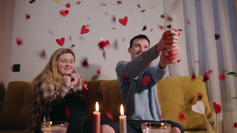 couple celebrating valentine's day with confetti