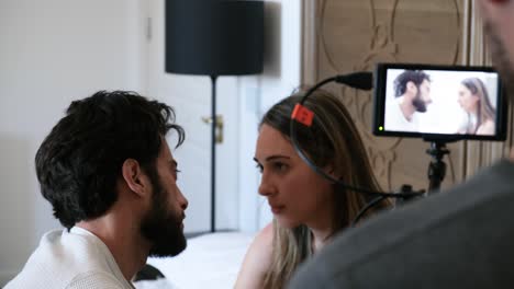 behind the scenes of a film production: couple's intense scene