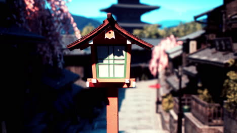 japanese village street with cherry blossoms and lanterns