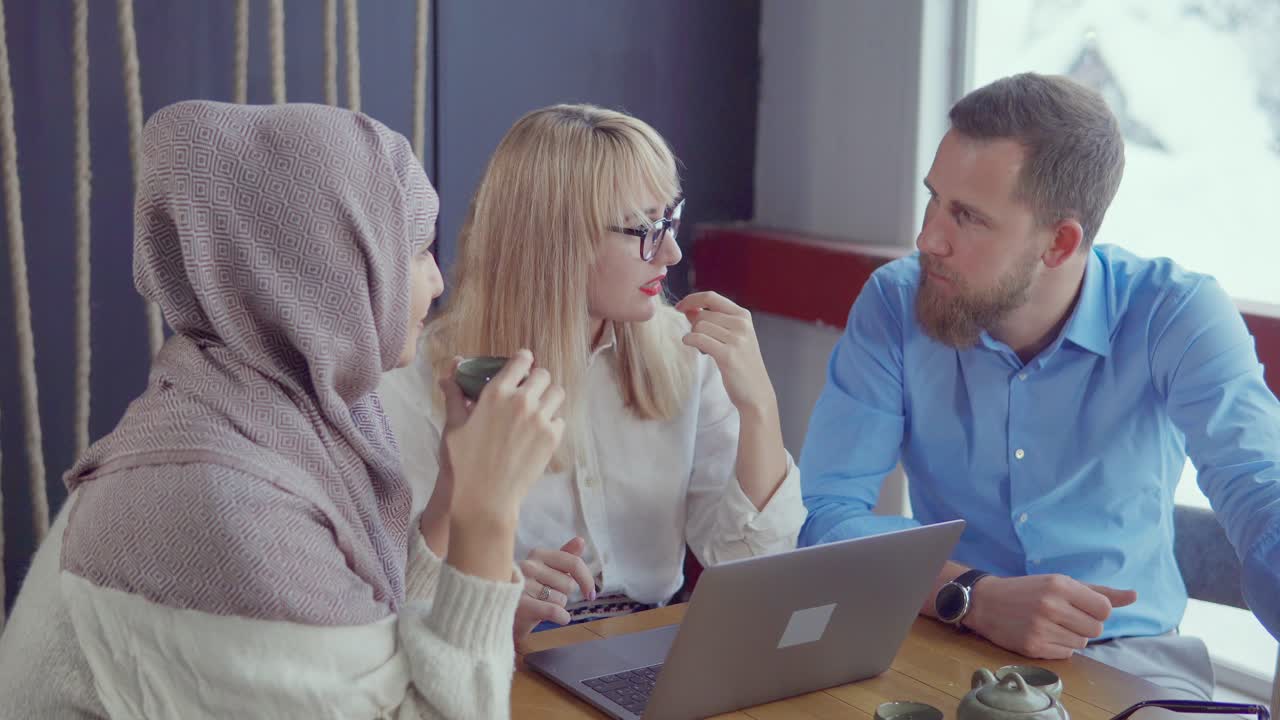 Business Meeting in a Cafe