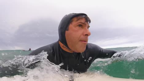 view of some strong rider generating some speed in praia do guincho, cascais, portugal