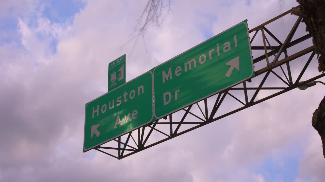 Timelapse of cloudy sky over Houston Ave and Memorial Dr in Houston, Texas