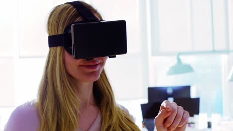 female executive using virtual reality headset