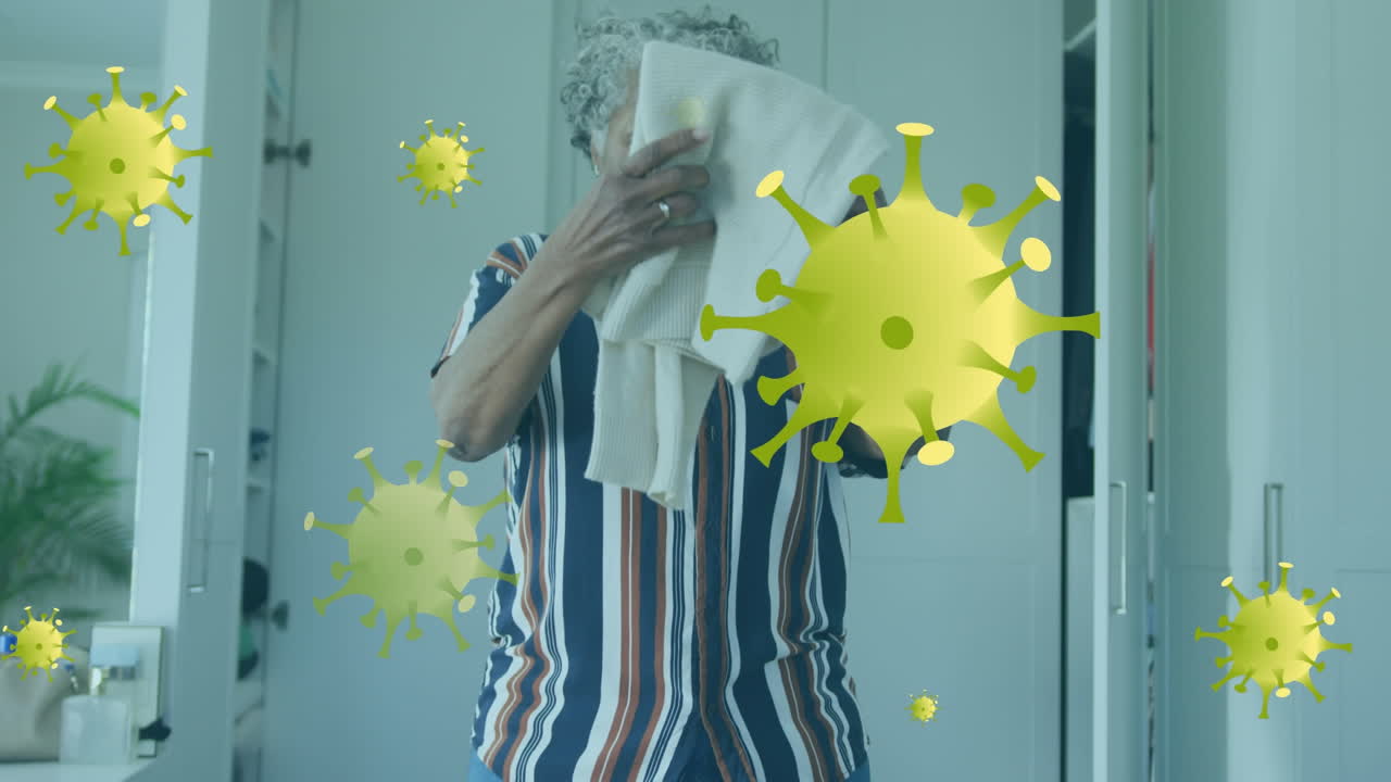 animación de células de virus sobre mujer afroamericana con toalla