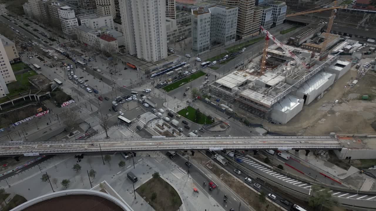 Porte de la Chapelle in Paris, busy highway in urban landscape, infrastructure, development. Aerial top-down forward