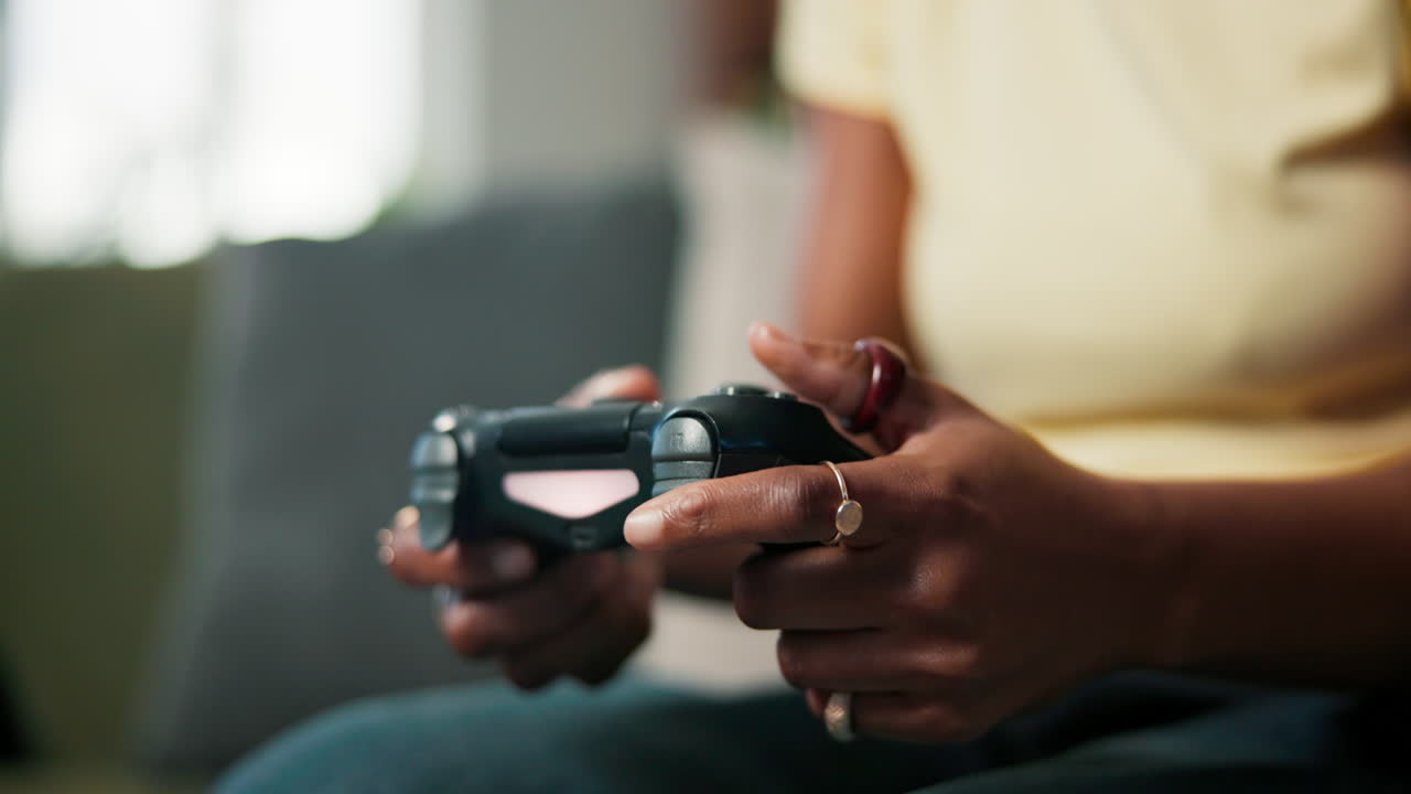 A person holding a game controller