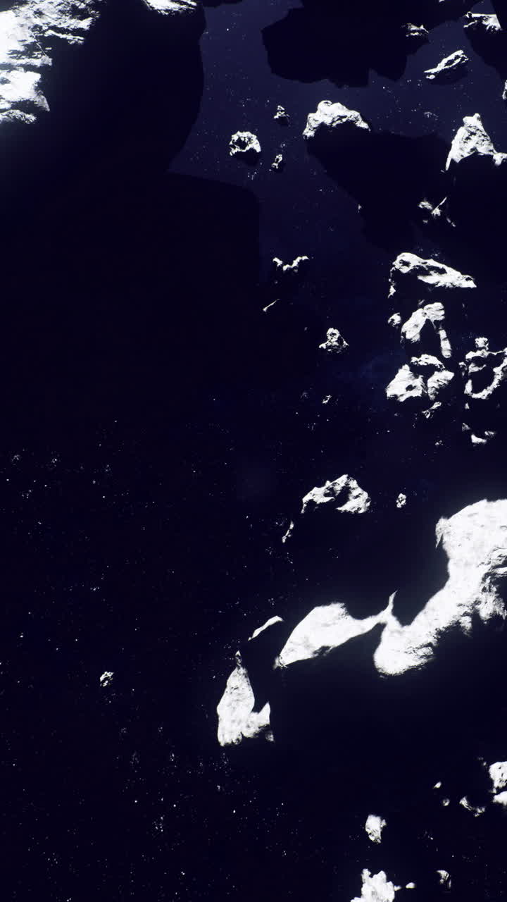暗い背景と遠くで輝く星々の中、宇宙に浮かぶ小惑星。