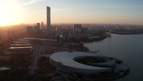 sunrise with cbd buildings. aerial in suzhou, china.