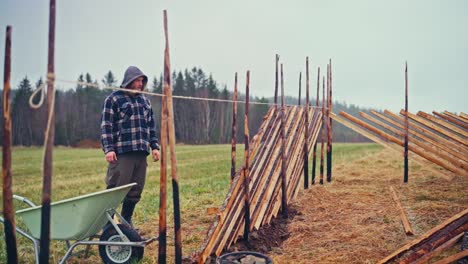 man builds skigard (traditional fence) in norway - timelapse