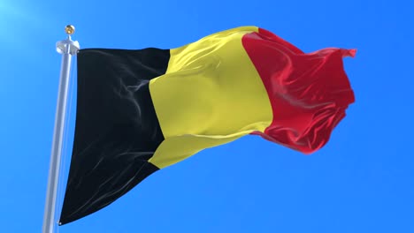 belgium flag waving at wind in slow with blue sky, loop