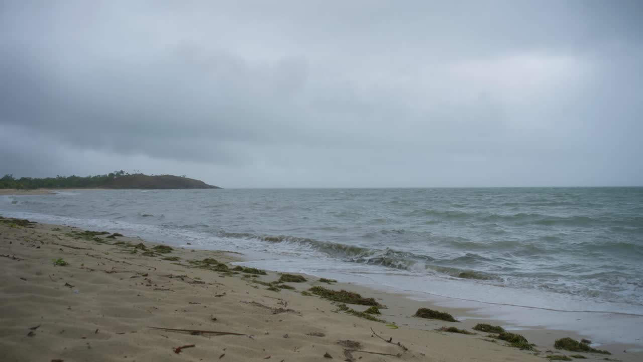 A remote beach as a monsoon storm approaches, in far northern Australia. Clip 2