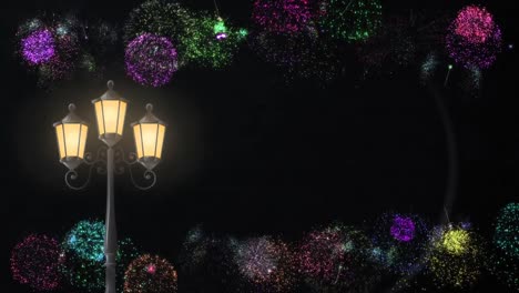 animation of street lamp over fireworks on black background