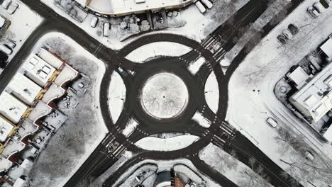 traffic circle road, sunny winter, aerial drone rotation stock video