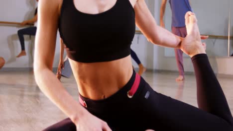 woman performing stretching exercise