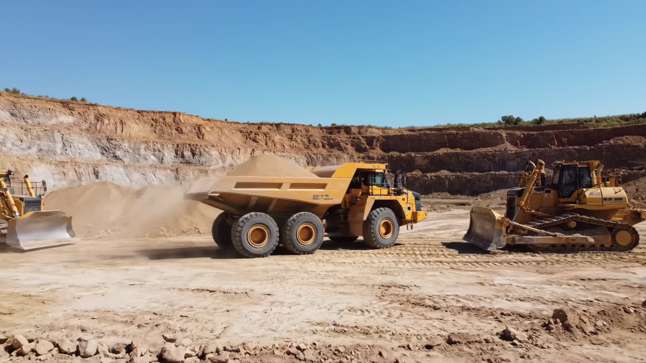 Heavy machinery operating in a quarry