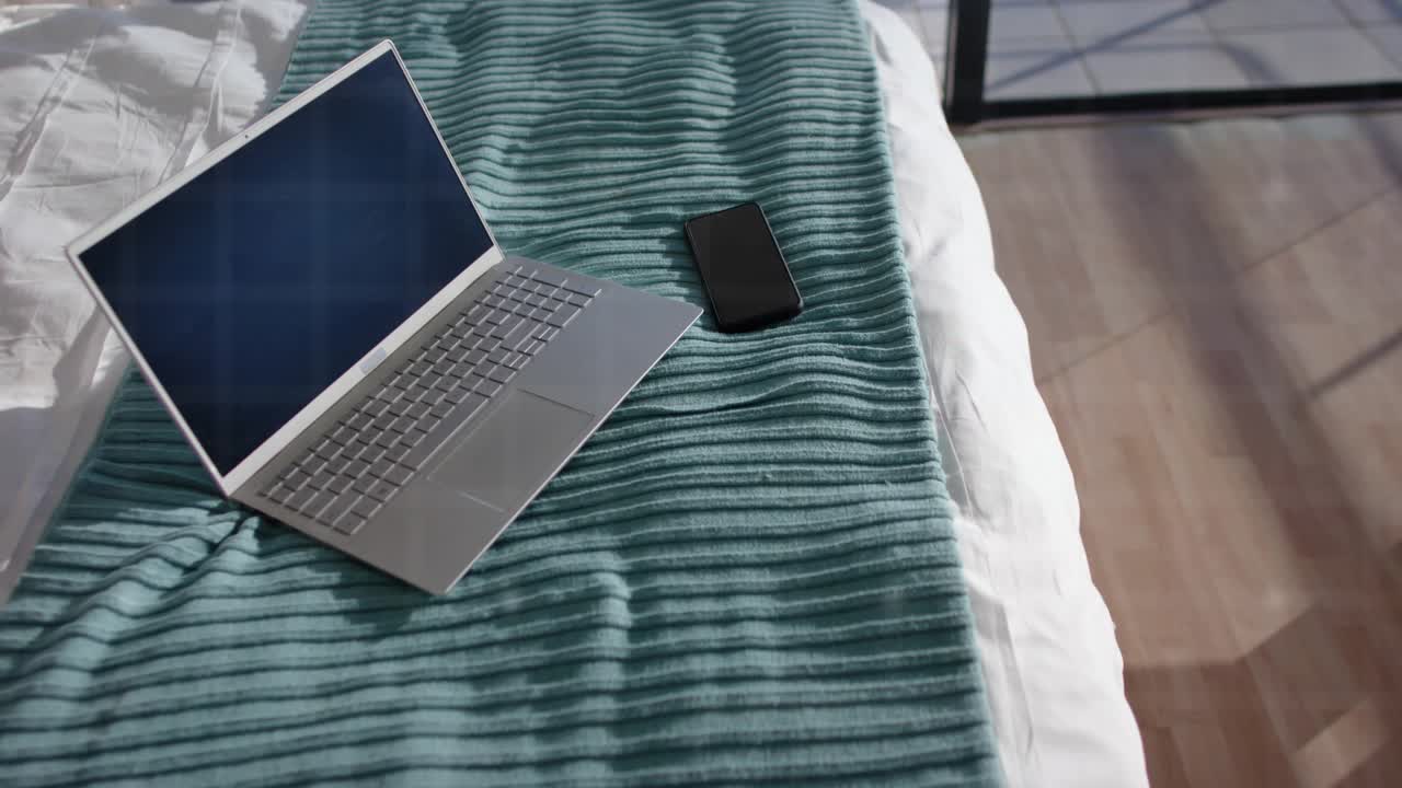 Sunlight reflection causing digital grid appearing over laptop, nodes linking, camera pulling back