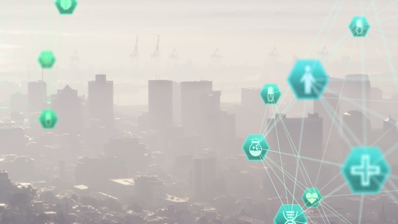 도시 풍경의 공중 전망에 대해 회전하는 의료 아이콘의 두 개의 글로브의 애니메이션