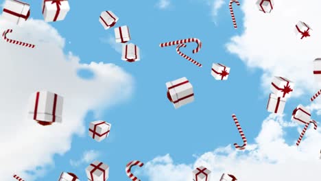 animación de regalos que caen y bastones de caramelo sobre el cielo nublado