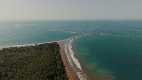 paradise tropical shore of whale tail beach, punta uvita in costa rica, central america