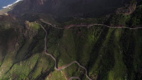 top-down parallax effect aerial shot of an epic mountain pass in tenerife