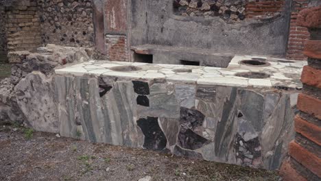 tiled service area in ancient pompeii, italy