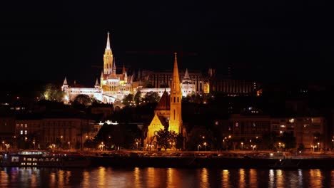 night timelapse of illuminated fisherman's bastion and matthias church, budapest