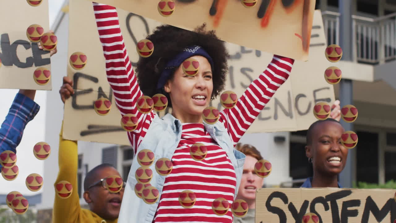 Activists holding protest signs outdoors for activism, with animated slogan graphics rising around