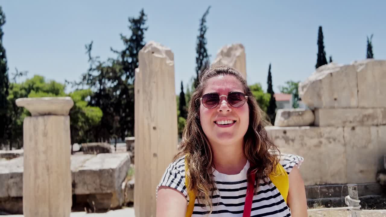 Smiling Woman's Selfie Among Ancient Acropolis Ruins, Athens, Greece