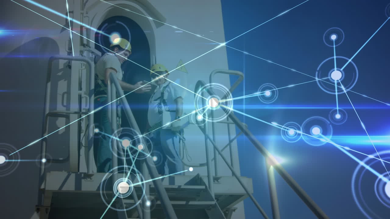animación de la red de conexiones sobre la turbina eólica y ingenieros masculinos en el fondo