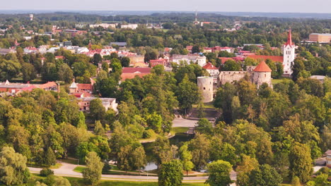 cesis is a charming, fairytale like village in latvia centered around a 13th century medieval castle and a famous orthodox church.the historic village is surrounded by the most picturesque setting.
