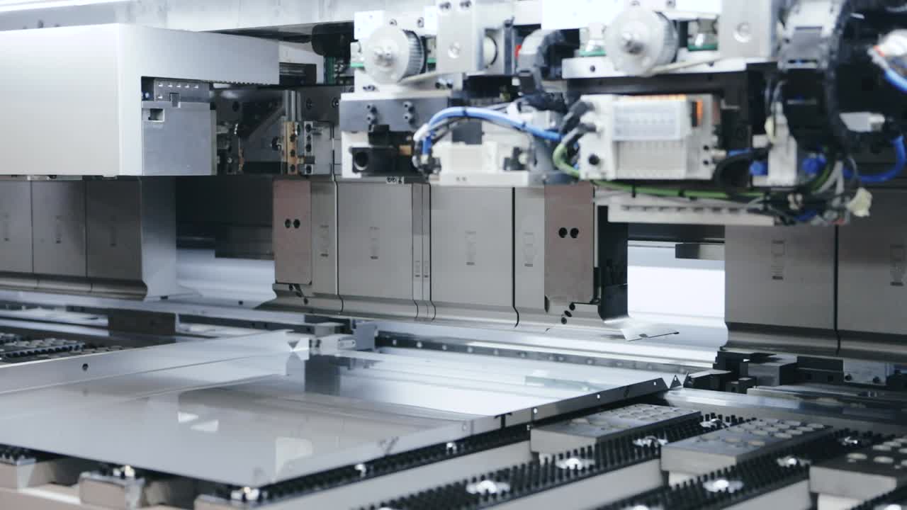 Automatic machine processing sheet metal in high tech workshop, parallax left