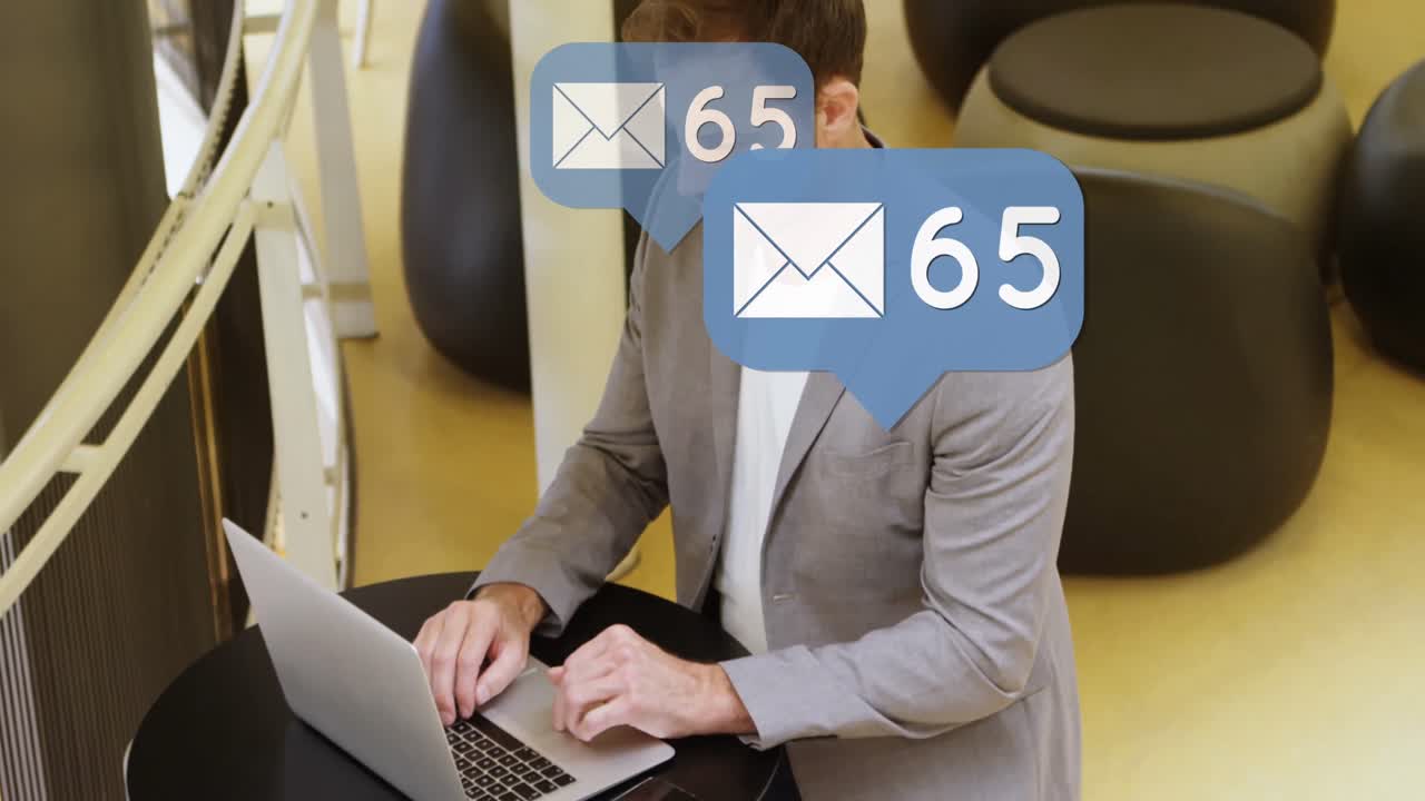 Animation of emoji icons and numbers over man using laptop