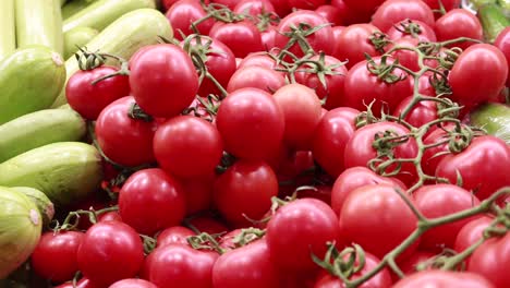 fresh red tomatoes on display at a market