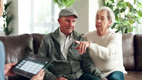 elderly couple consult with healthcare provider at home