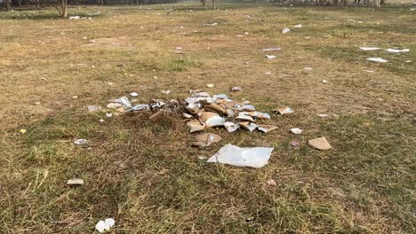 maidan covered with plastic wastes on a winter foggy morning in kolkata, india after cpm rally in brigade ground 2024