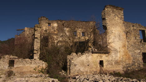 crumbling buildings in an abandoned village