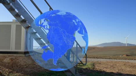 animation of globe over wind turbine and engineer in countryside