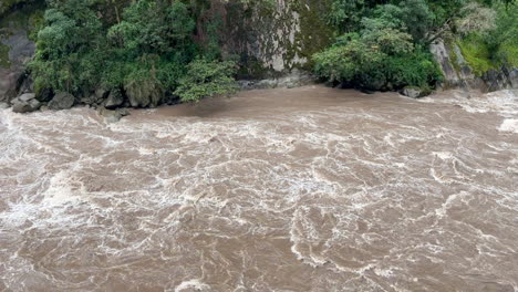 this is a video of the vilcanota river flooding at the base of machu picchu after a heavy rainstorm.