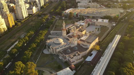 Aerial-top-down-shot-of-King-Fahd-Islamic-Cultural-Center-in-Buenos-Aires-City-at-sunset-time