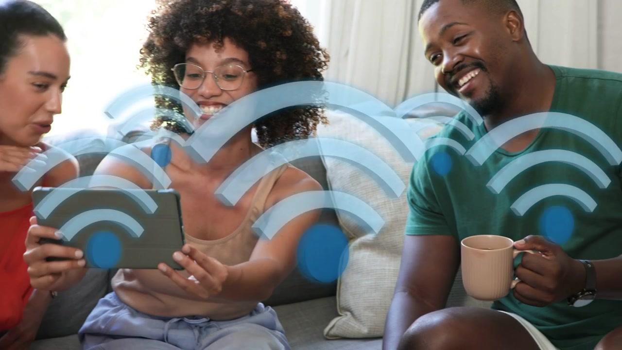 Center woman tapping tablet, starting blue Wi?Fi icons, friends leaning, laughing, sharing