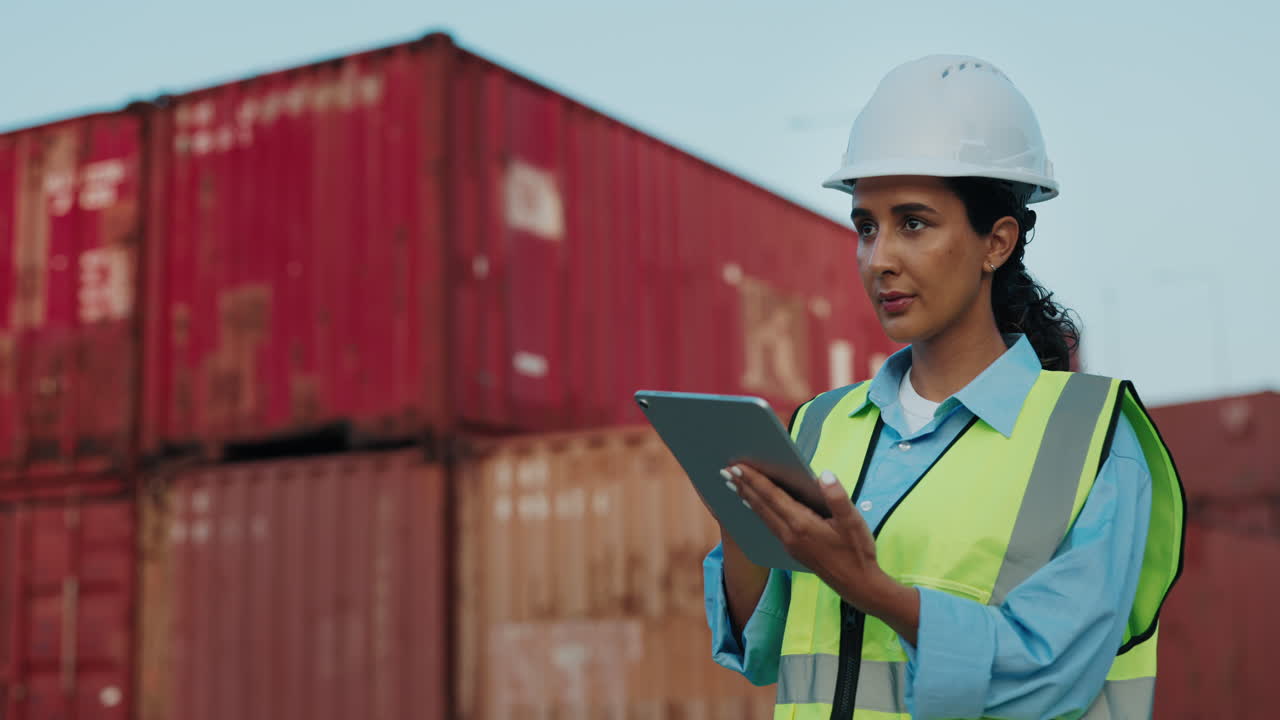 Female Engineer at Port with Tablet