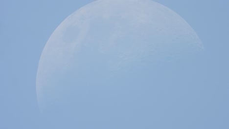 day time moon in blue sky