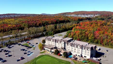 Aerial-drone-footage:-Quebec-hotel-amidst-fall's-vibrant-hues