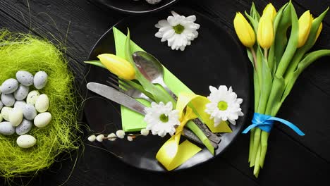 Easter-spring-table-dishware-composition-with-yellow-tulip-flower