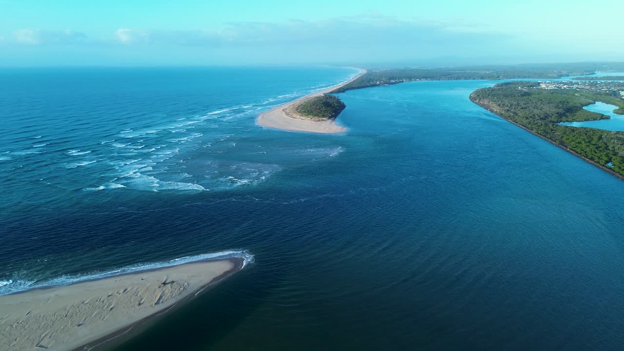 Drone aerial landscape of Manning River lake inlet channel and sand dunes with ocean waves breaking on beach shoreline in Harrington Barrington Coast near Taree NSW Australia nature travel outdoors
