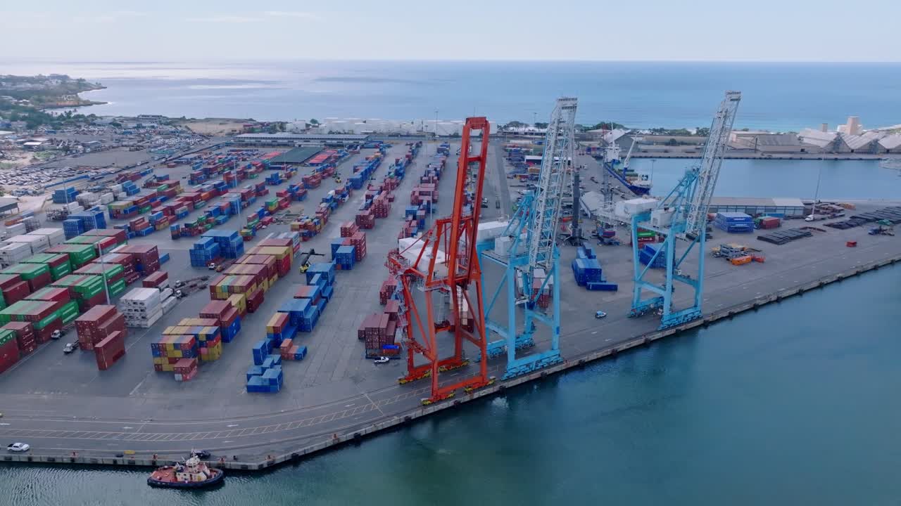Huge cranes and colorful containers at Haina port in Santo Domingo, Dominican Republic